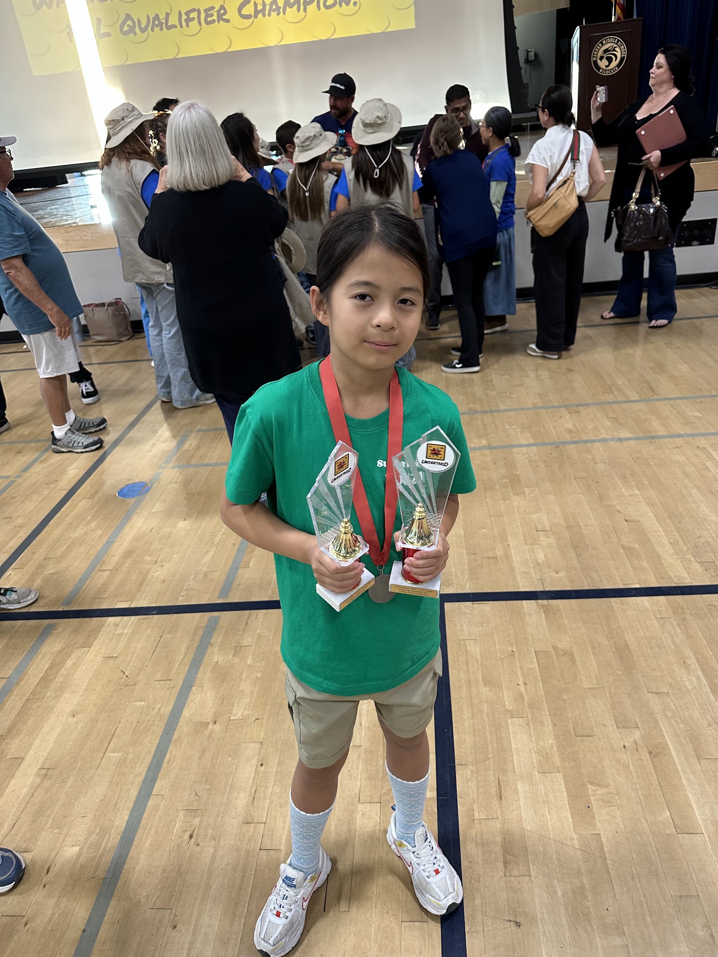 Team celebrating on stage